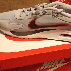 Nike Light Gray Sneakers with Black and Red Accents